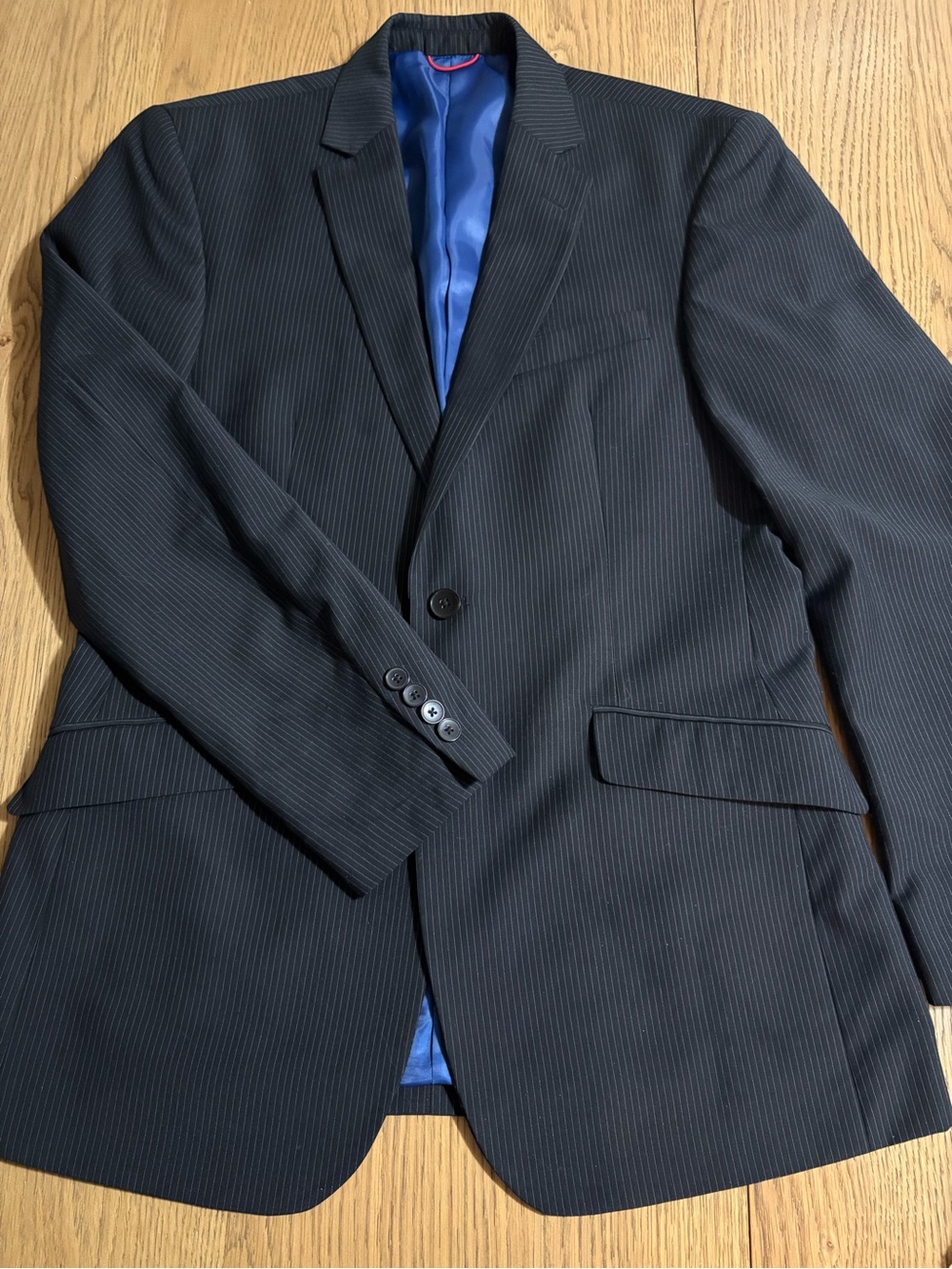 Men's Black Pinstriped Suit Jacket with Blue Lining